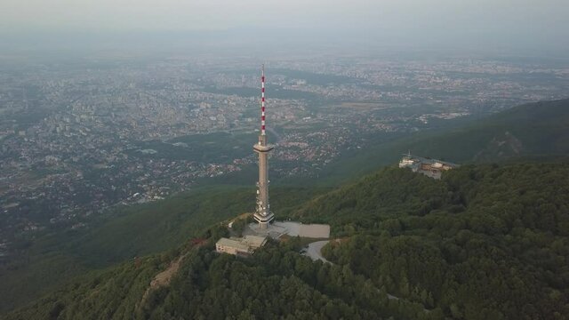 SOFIA, BULGARIA - Jun 11, 2021: An aerial panoramic view of Kopititoto tower, Vitosha Mountain, and the city of Sofia, Bulgaria