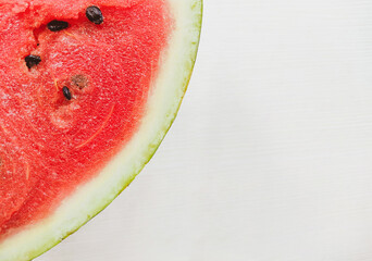 Background with a slice of red watermelon