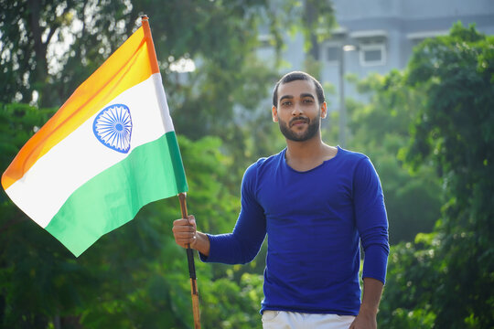 indian man with indian flag outdoor image