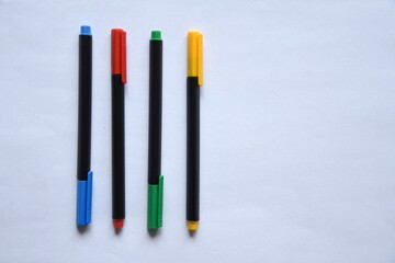 Overhead photo of colorful pens