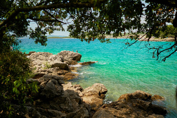 Rocky coast of the Adriatic Sea on the island of Krk near the town of the same name Krk in Croatia