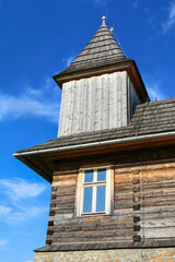 DABROWKA ,POLAND - JUNE 01, 2021: Detail of a wooden castle in Dabrowka, Poland.