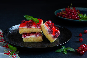Delicious berries cake with cream filling. Dark mood.