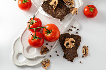 Natural gluten-free bread without flour and sugar with mushrooms and tomatoes, top view