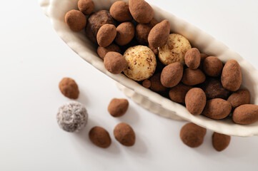 natural chocolate truffles, white background, top view, close-up