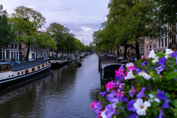 Fototapeta na wymiar Amsterdam Canal and Flowers
