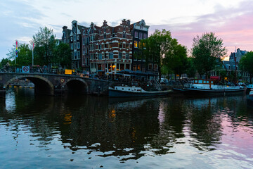Obraz premium Iconic Amsterdam Houses at Sunset