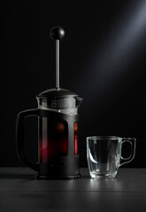 French press coffee and cup.