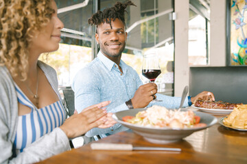 Couple having a lunch date at a restaurant.