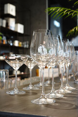 Empty glasses on the table. Set of different glasses.