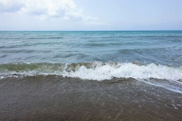 blue sky and sea with waves