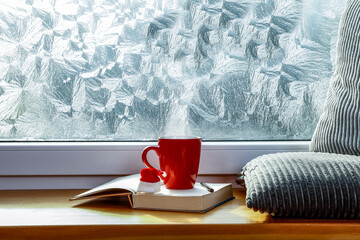 Christmas window and a beautiful winter outside with an empty window sill 