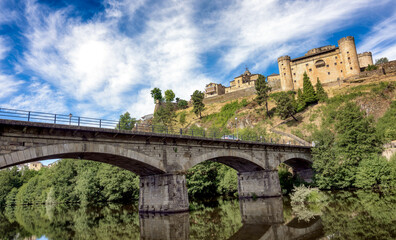Fototapeta na wymiar View of the monumental town of Puebla de Sanabria, Spain, and bridge over river Tera.