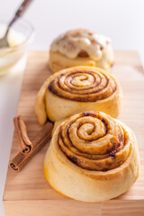 Sweet homemade cinnamon roll, bun with cinnamon powder