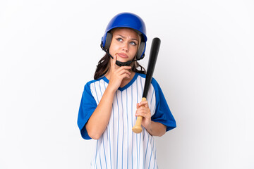 Baseball Russian girl player with helmet and bat isolated on white background having doubts while looking up