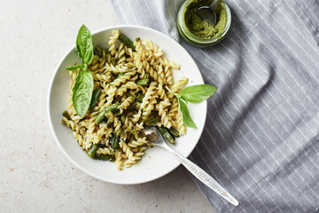 Fusilli pesto pasta with green beans.