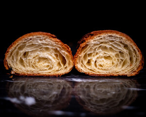 Sliced Croissant Crumb Shot on Black Marble
