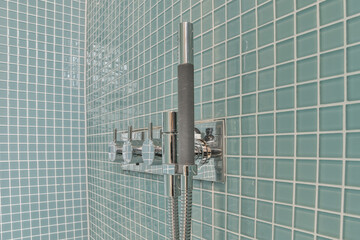 Modern shower stall in a bright bathroom