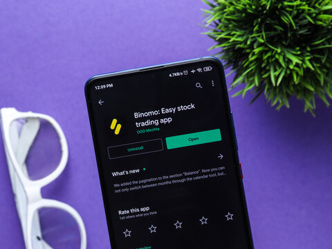 Assam, india - July 28, 2020 : Binomo a easy online stock trading app.