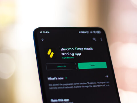 Assam, india - July 28, 2020 : Binomo a easy online stock trading app.