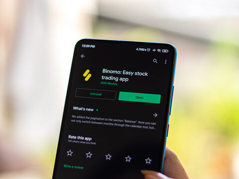 Assam, india - July 28, 2020 : Binomo a easy online stock trading app.