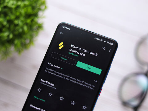 Assam, india - July 28, 2020 : Binomo a easy online stock trading app.