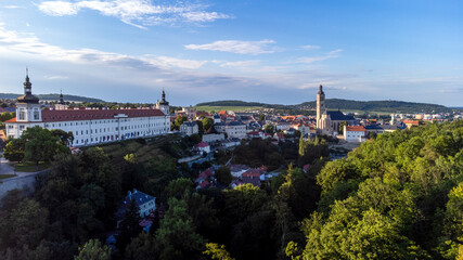 Fototapeta premium Aerial Kutna Hora town cityscape, vineyard, gothic church of St. Barbara