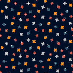 Vector seamless autumn pattern of cute tiny orange, red, blue, and grey leaves and flowers stylized in a flat and doodle style in the dark background. Hand-drawn leaf texture. Background for textile