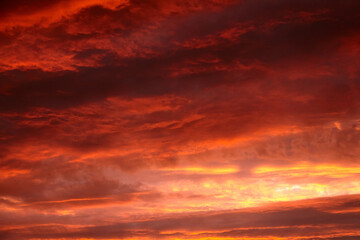 Red sunset sky with dramatic clouds