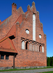 Built in 1904, the Catholic Church of M.B. Gromniczna in the village of Wiśniowo Ełckie in Masuria, Poland. The photos show architectural details and a general view of the temple.