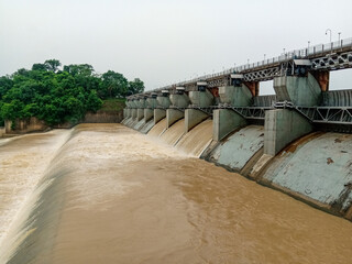 Aerial image of the Mandira Dam near Rourkela releasing water from its spillway.