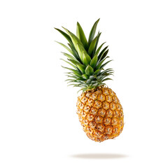 Fresh juicy tropical fruit pineapple flying isolated on white background.