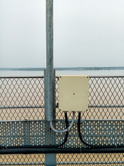 Street light electric box on mandira dam bridge , white electric box