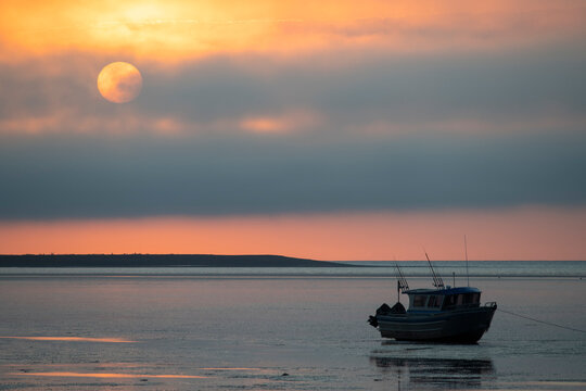 Boat on Cook Inlet Tide Flats at Low Tide, Sunrise