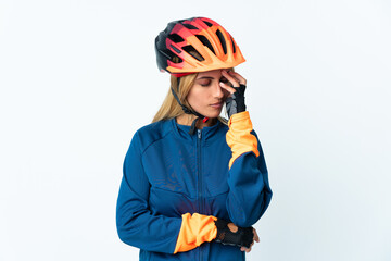 Young blonde Uruguayan cyclist woman isolated on background with headache