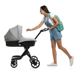 Happy young woman with baby stroller on white background