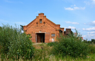 Fototapeta na wymiar The Boguslavsky estate in Gomel. Stables building. Belarus. Barn. Service building