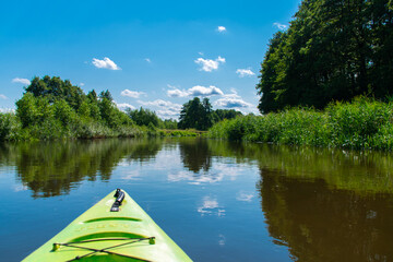 canoeing on the Narew river in Podlasie, physical activity on the river, beautiful landscape on the...