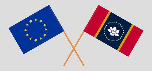 Crossed flags of the EU and the State of Mississippi. Official colors. Correct proportion