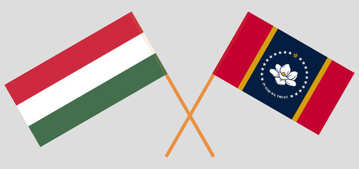 Crossed flags of Hungary and the State of Mississippi. Official colors. Correct proportion
