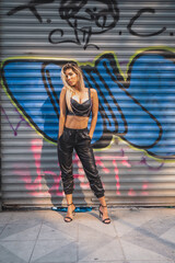 portrait of a woman on a graffiti wall