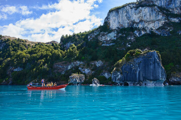 Tourist boat exploring the surreal Marble Caves (Capilla de Mármol), Rio Tranquilo, Aysen,...