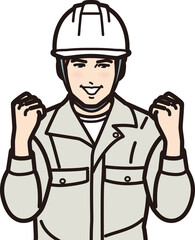 ガッツポーズするヘルメットの男性