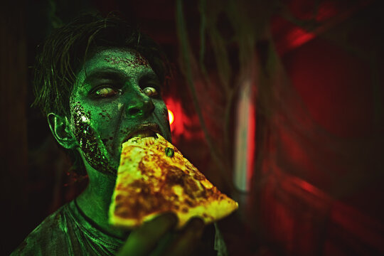 creepy monster eats pizza