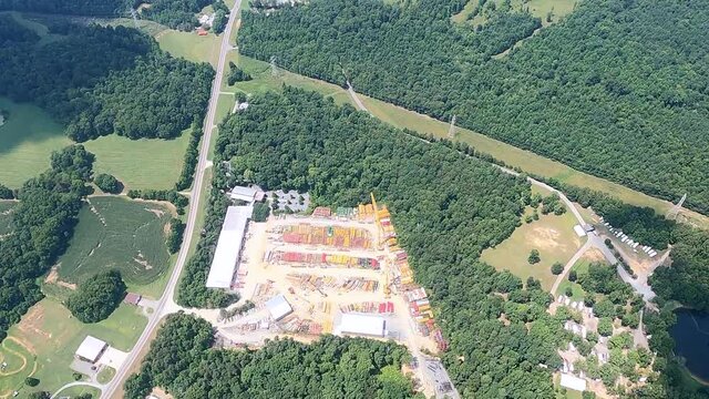 Colorful construction yard and trees covered landscape, Swepsonville, North Carolina, USA