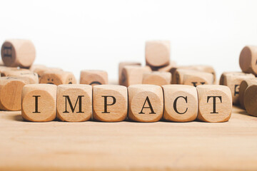 Impact Word Written In Wooden Cube