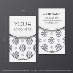 Vector Preparation of business cards in white with gorgeous black ornaments. Template for print design business card with monogram patterns.