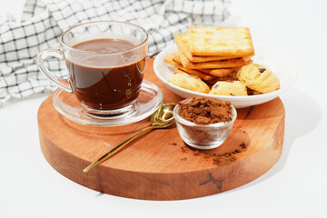 Hot chocolate in a glass and sugar crackers There is space on the background