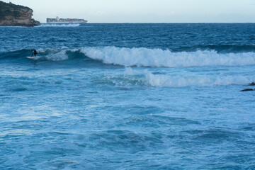 male surfer in action on a wave in a remote island location