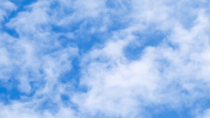 Background of blue sky with white clouds.